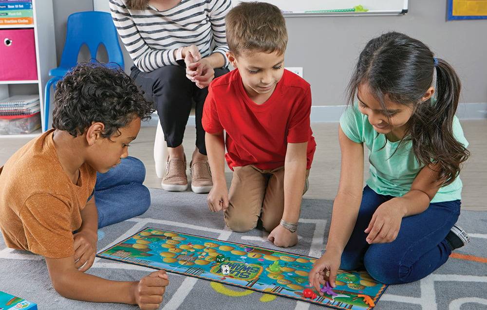 children playing board game